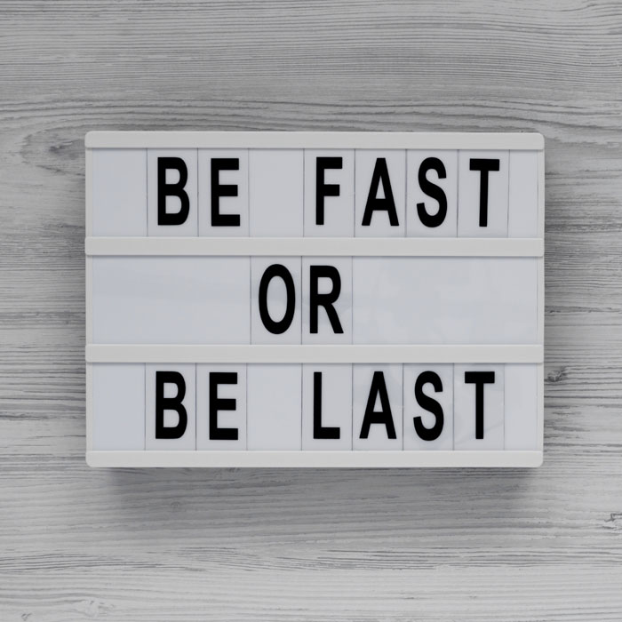 A sign with the text Be fast or be last