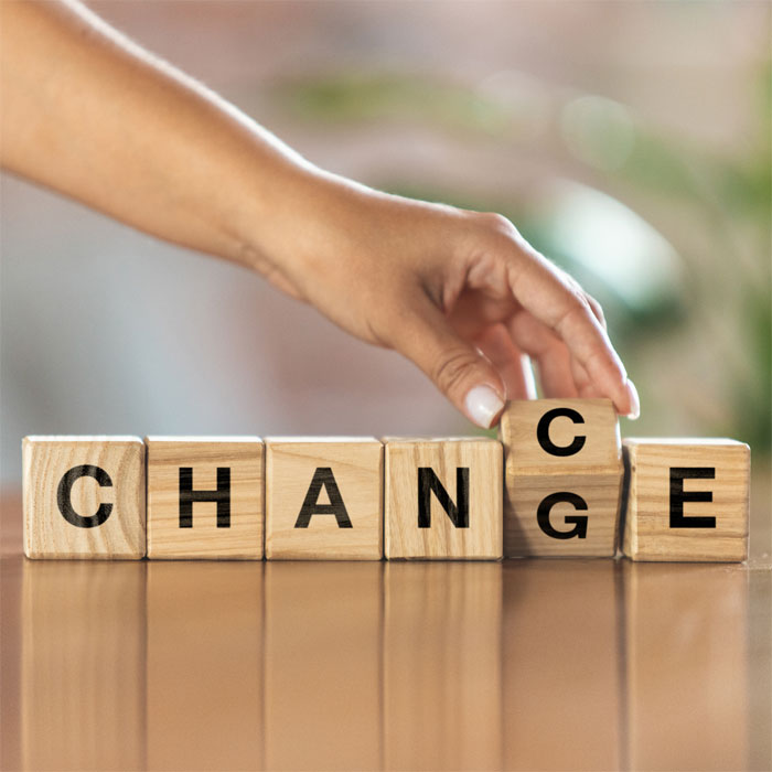 Wooden blocks spelling the word CHANGE
